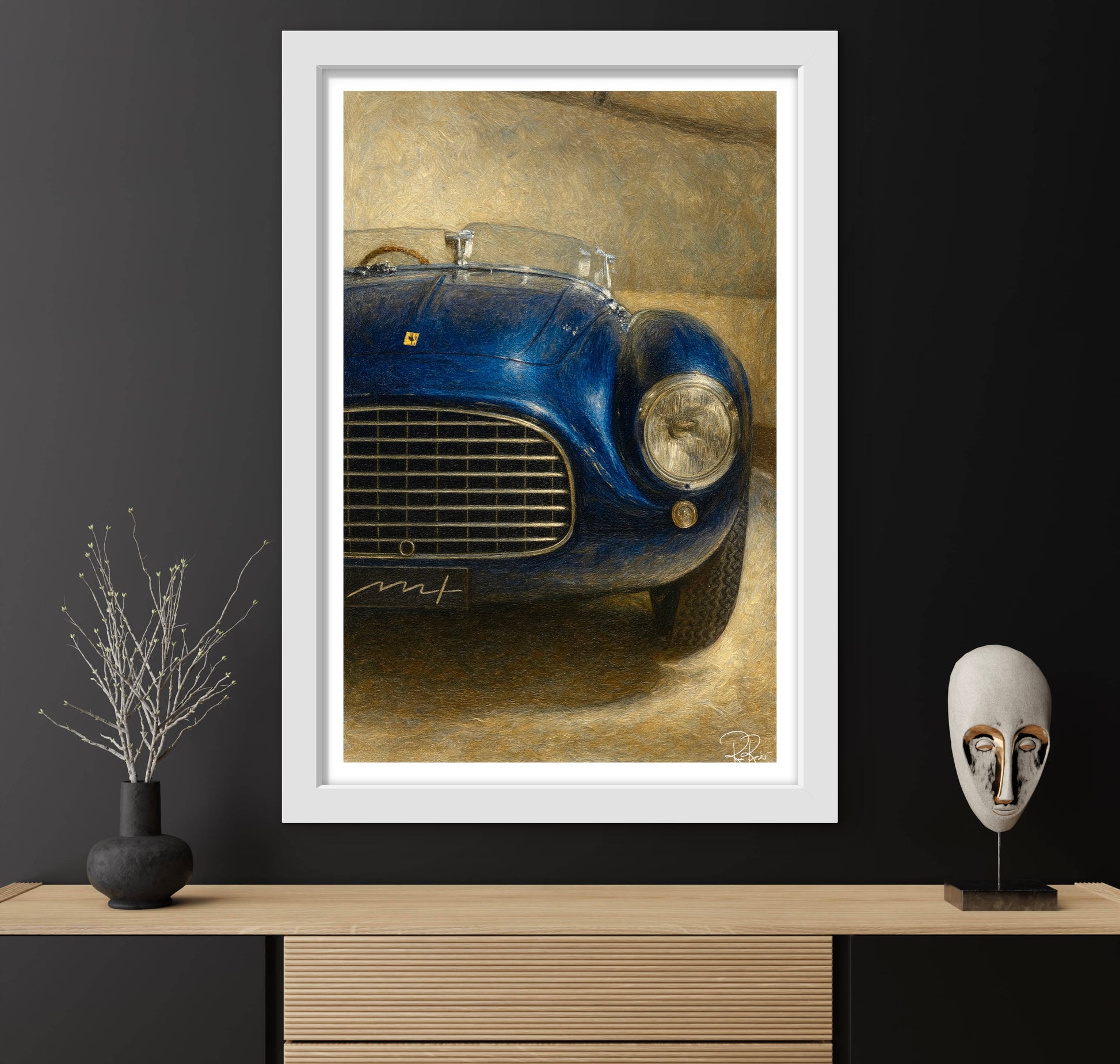 Framed artwork of a blue vintage car on a dark wall with decorative items.