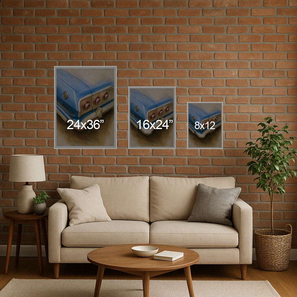 Living room with a beige sofa, wooden coffee table, and three wall art prints on a brick wall.