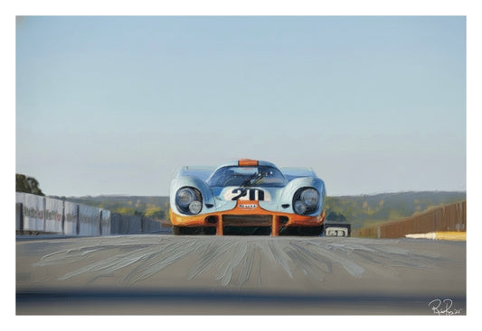 Vintage race car on a track with a clear sky