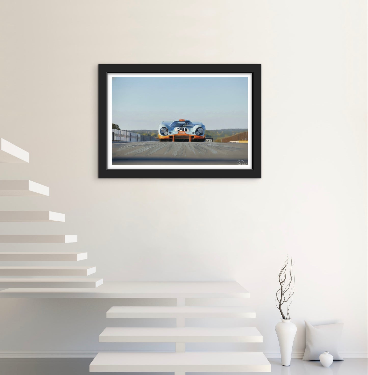 Framed artwork of a vintage car on a wall with a modern interior setting.