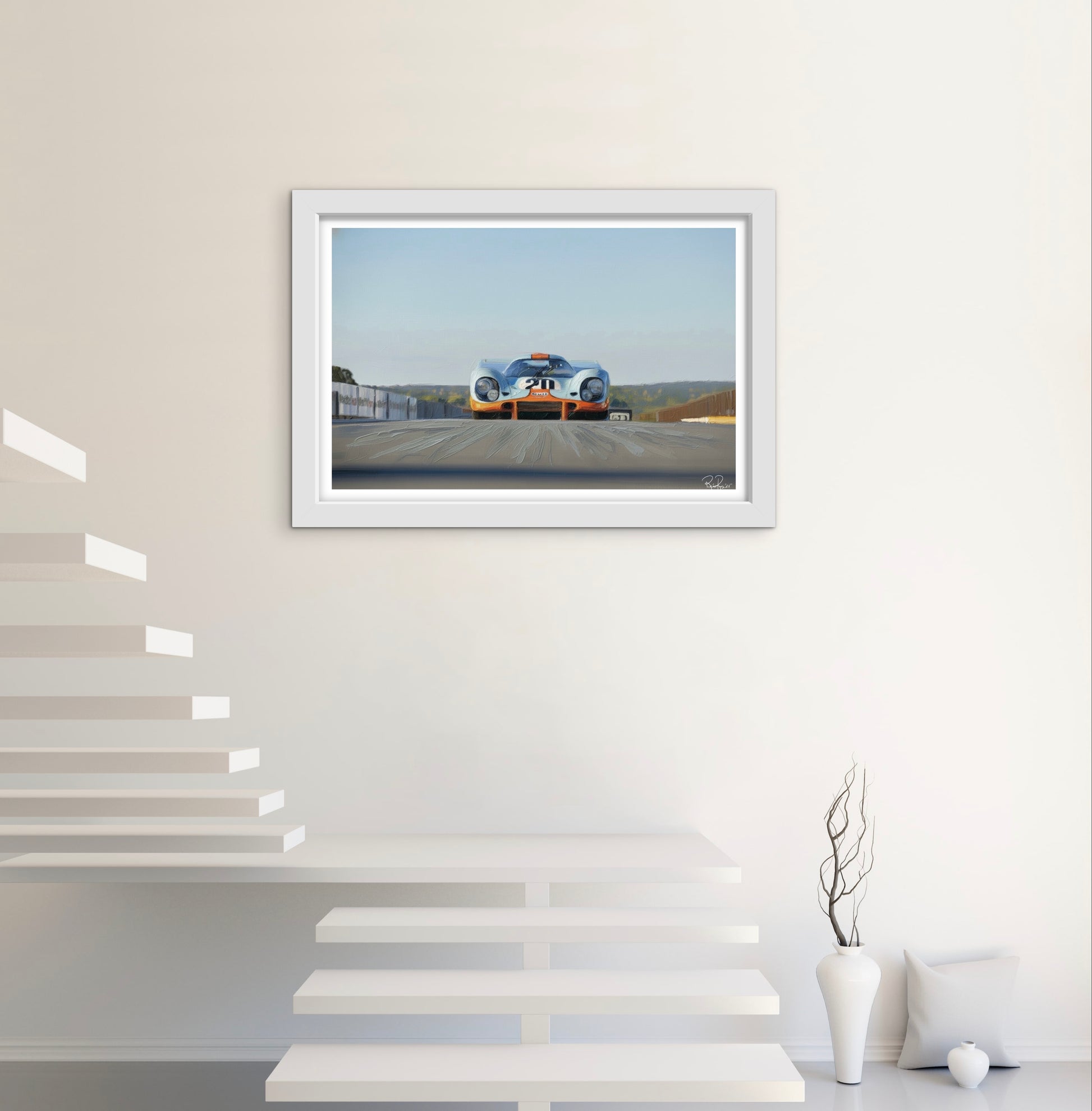 Framed artwork of a race car on a wall in a modern interior setting