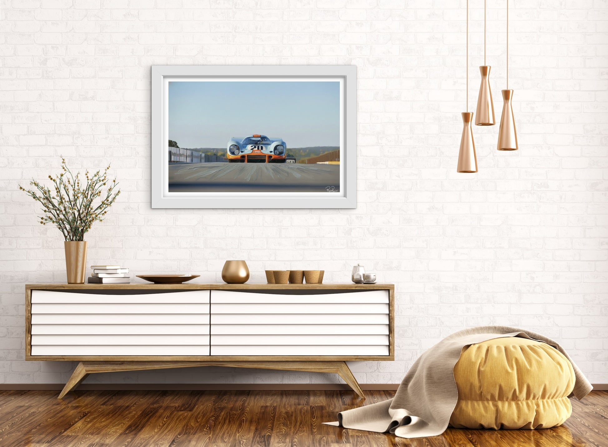 Modern living room with a TV displaying an image of a car on a road, wooden cabinet, and decorative items.