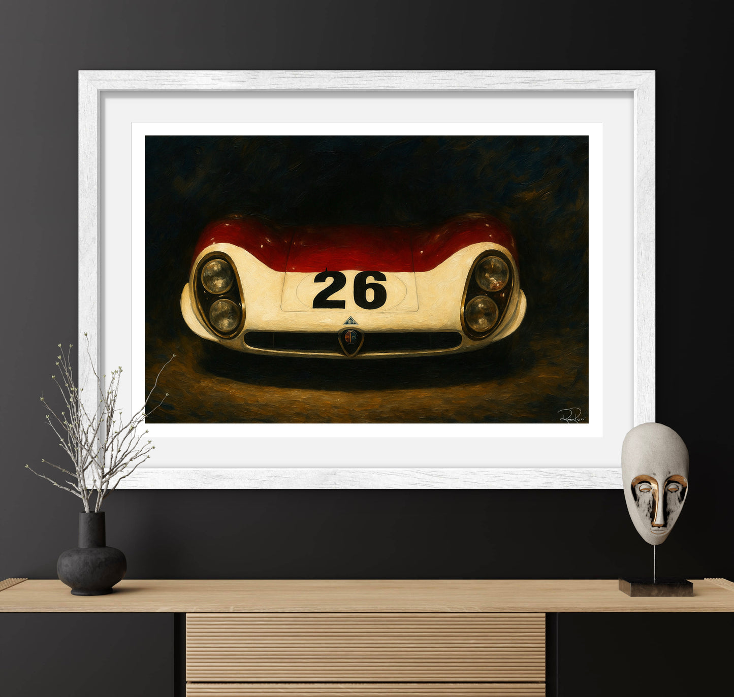 Framed artwork of a vintage race car with the number 26 on a dark wall.