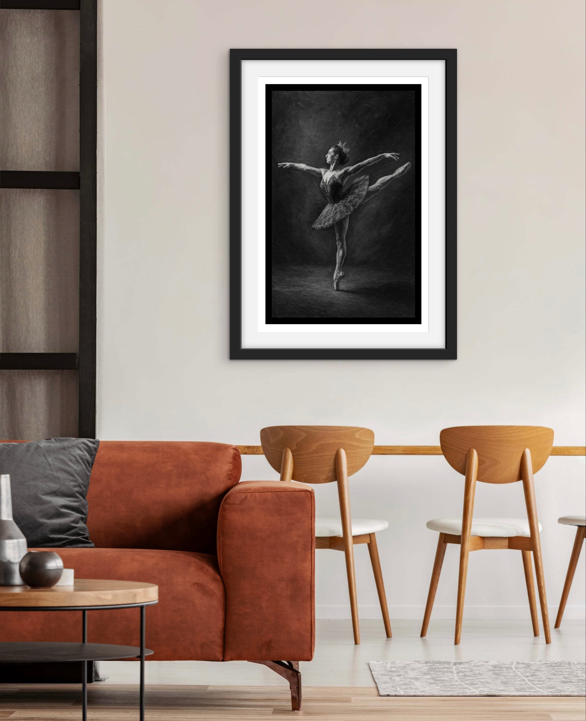 Framed black and white art print of a dancer in a modern living room.