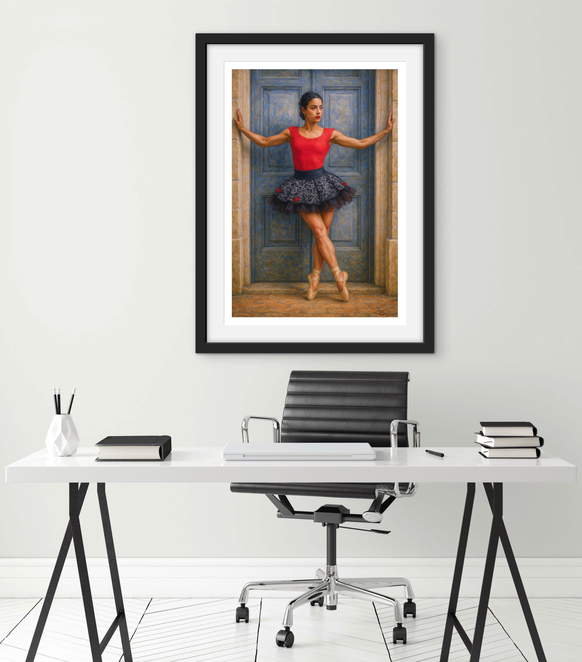 Framed artwork of a dancer in a modern office setting