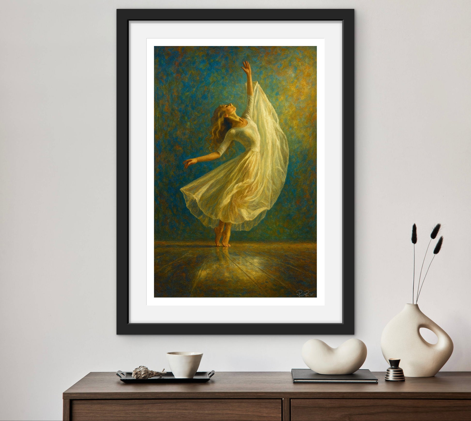 Framed painting of a woman in a flowing dress on a wall above a wooden console table with decorative items.