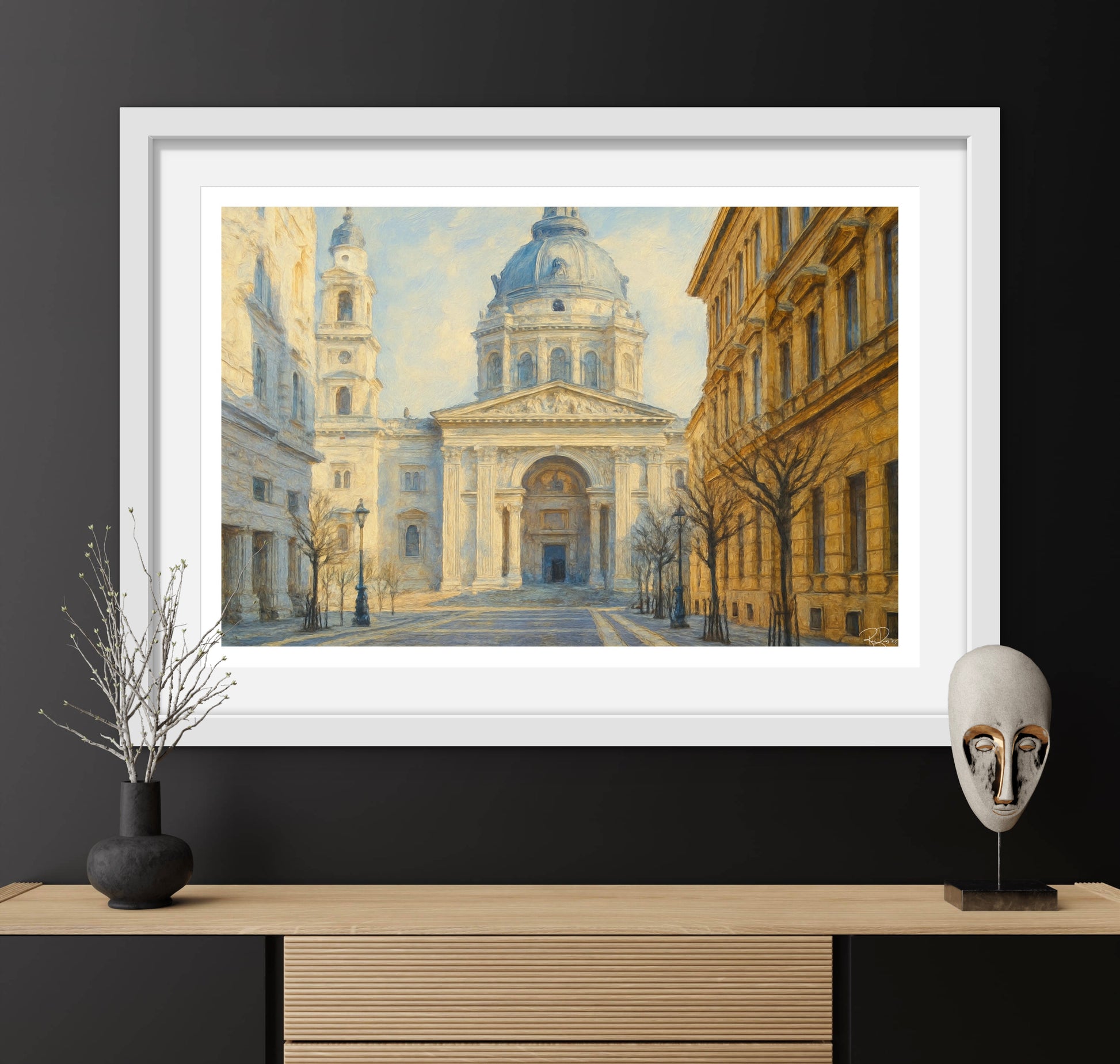 Framed artwork of a classical building on a black wall with decorative items.