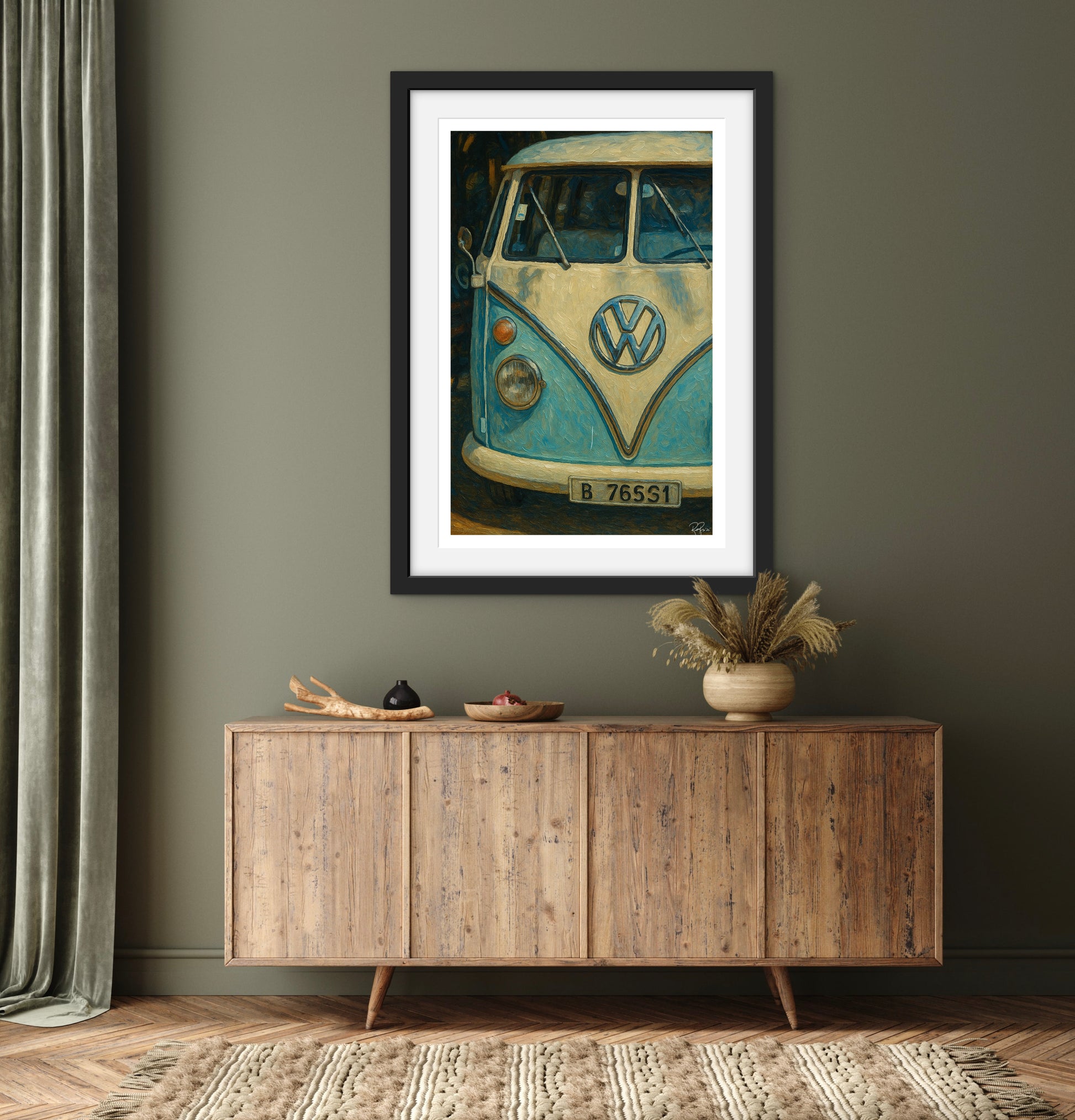 Framed artwork of a vintage Volkswagen van on a wall above a wooden sideboard.
