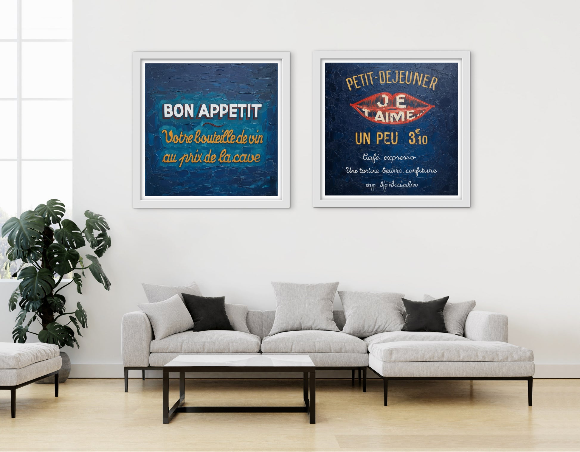 Living room with a sofa and two framed posters on the wall.