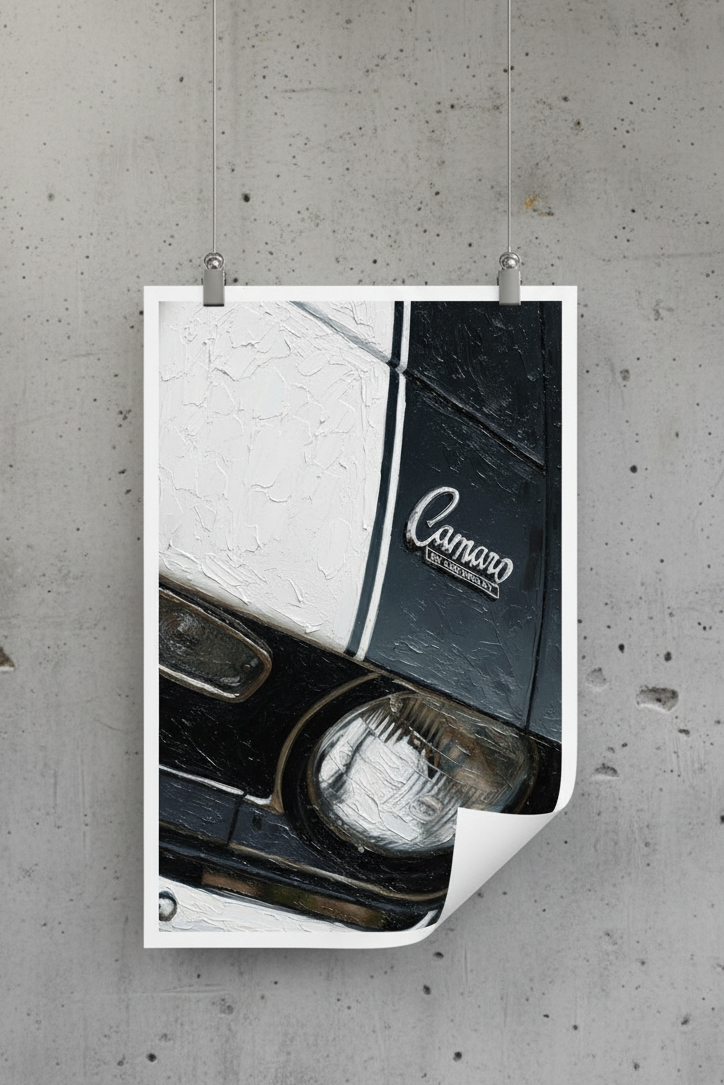 Poster of a car's headlight and 'Camaro' logo on a concrete wall.