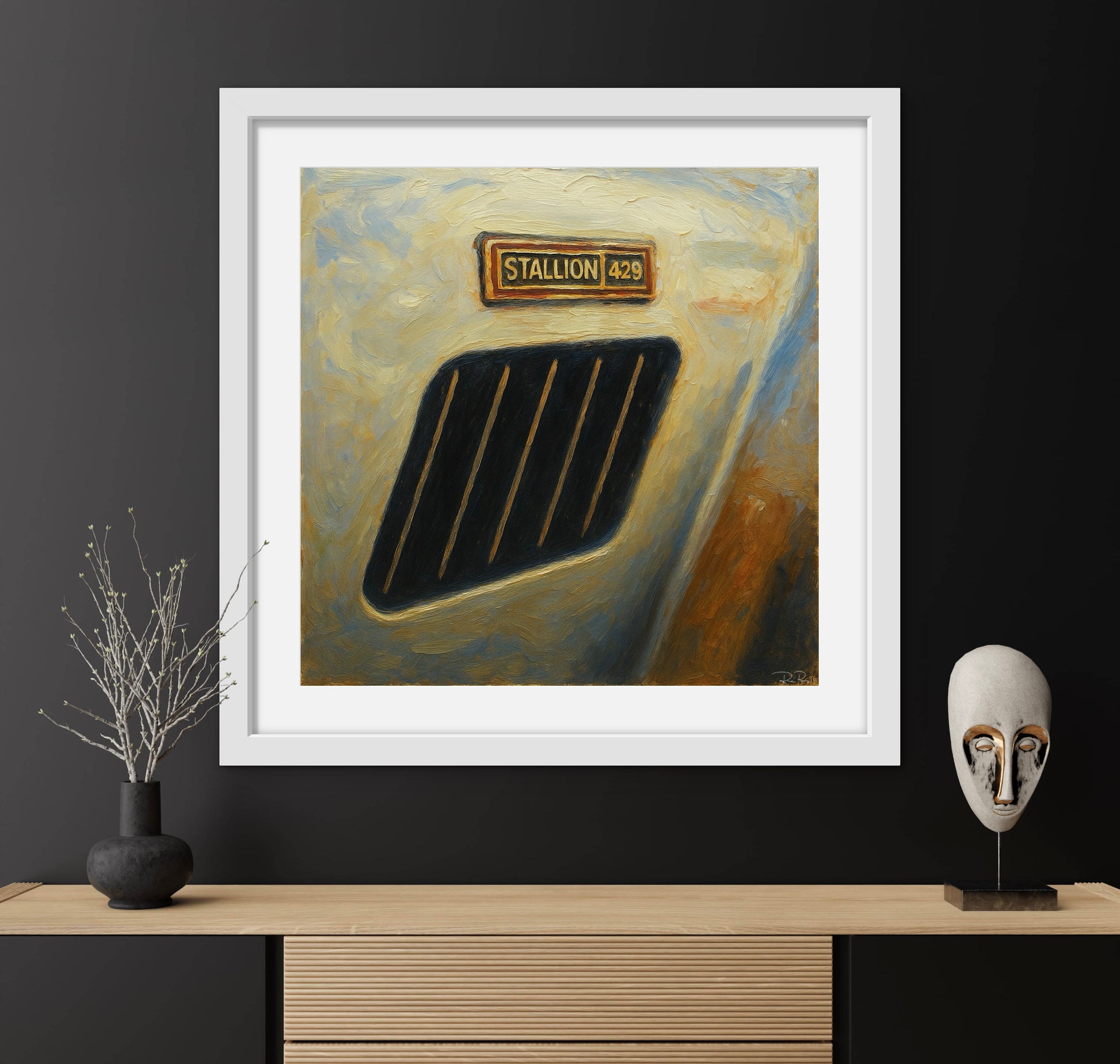 Framed abstract painting on a dark wall with decorative items below.