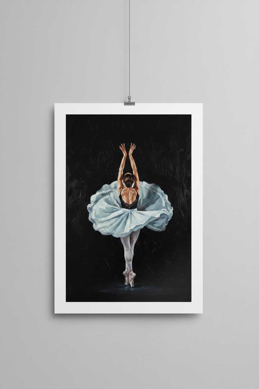 Framed artwork of a ballerina in a blue tutu against a black background, hanging on a gray wall.