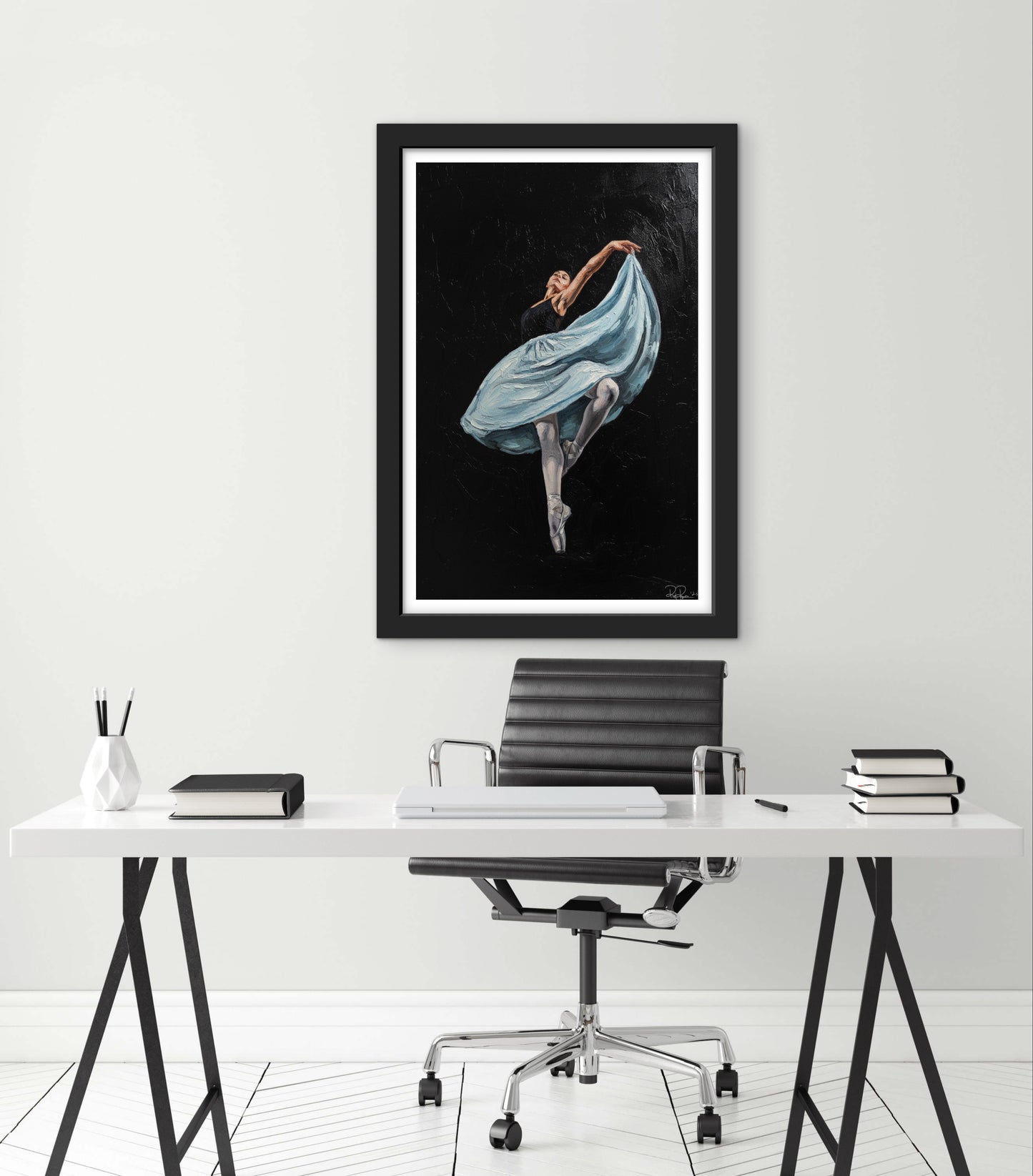 Framed artwork of a dancer in a modern office setting