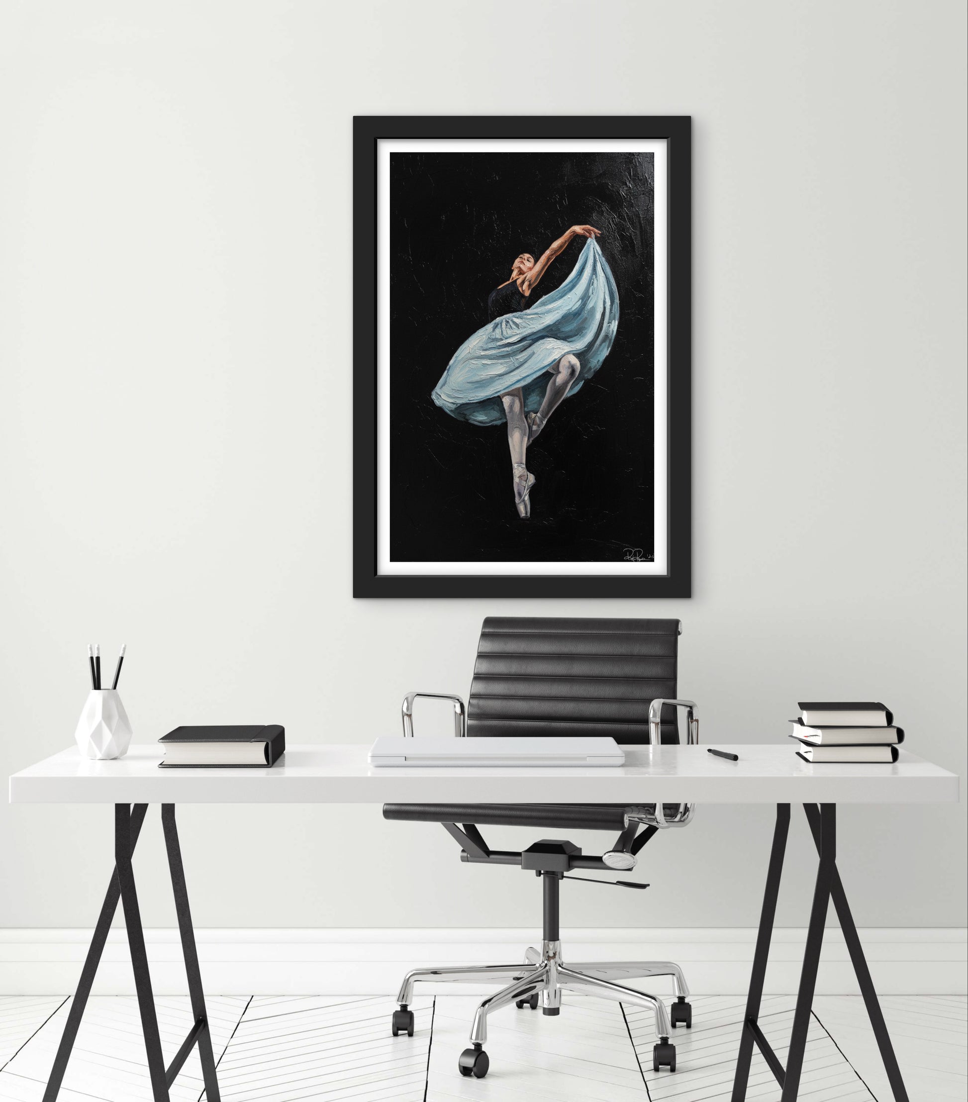 Framed artwork of a dancer in a modern office setting