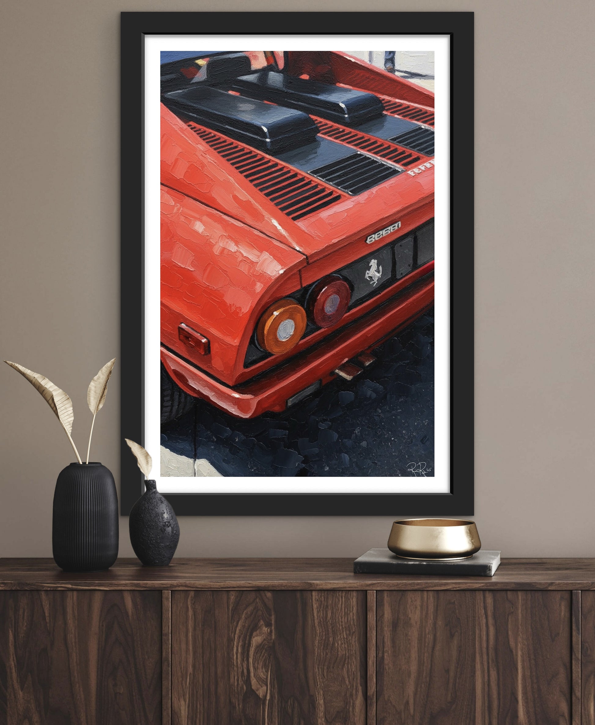 Framed artwork of a red sports car on a wooden shelf with decorative items.