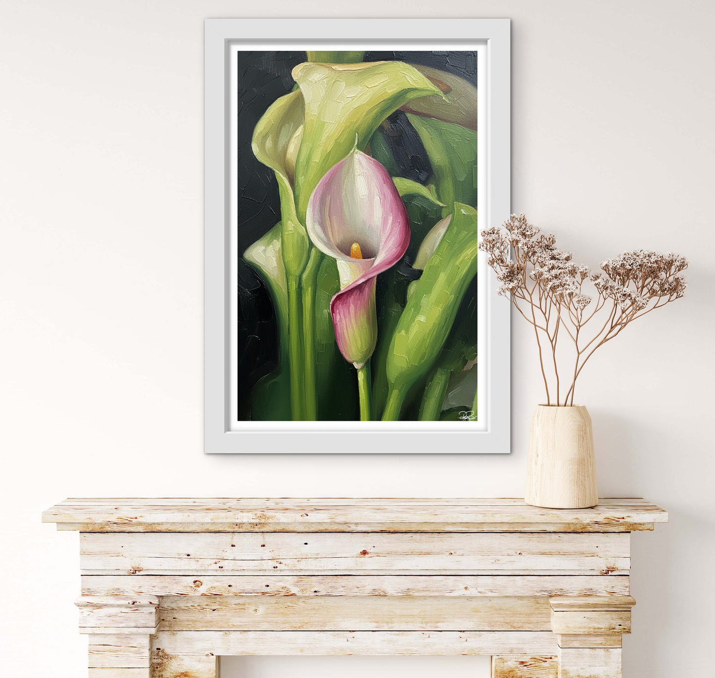 Framed artwork of a pink and green lily on a wooden surface with a vase of dried flowers.