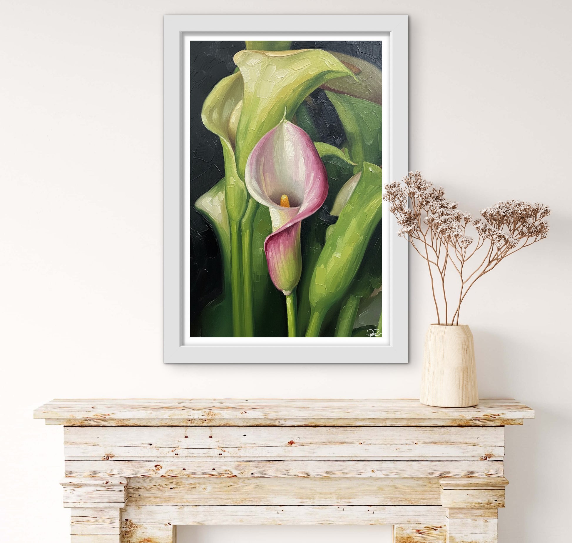 Framed artwork of a pink and green lily on a wooden surface with a vase of dried flowers.