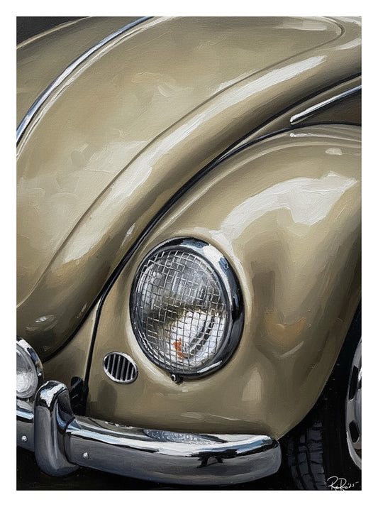 Close-up of a vintage car's headlight and hood