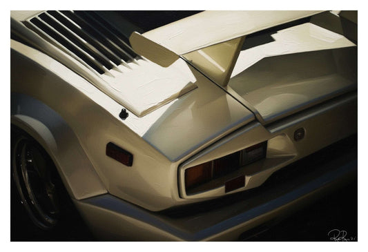 Close-up of a car's hood with a prominent air intake and spoiler.