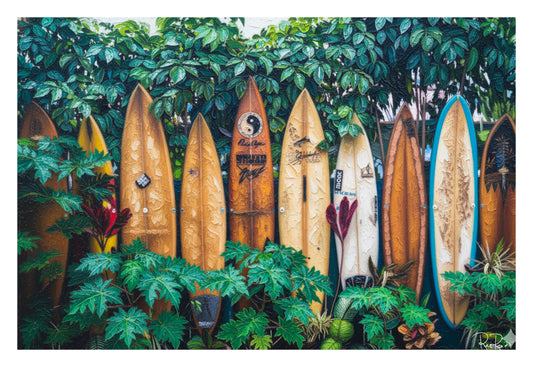 Collection of surfboards leaning against a leafy green wall