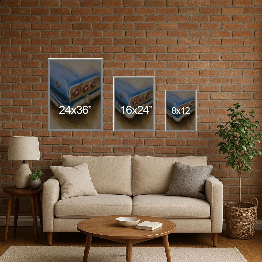 Living room with a beige sofa, wooden coffee table, and three wall art prints on a brick wall.