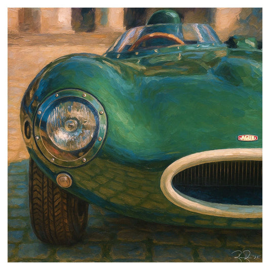 Close-up of a vintage green Jag D Type with 'Jaguar' branding on a textured background