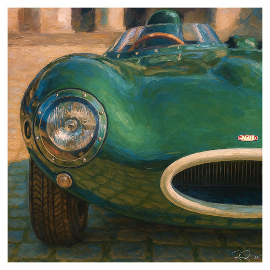 Close-up of a vintage green Jag D Type with 'Jaguar' branding on a textured background
