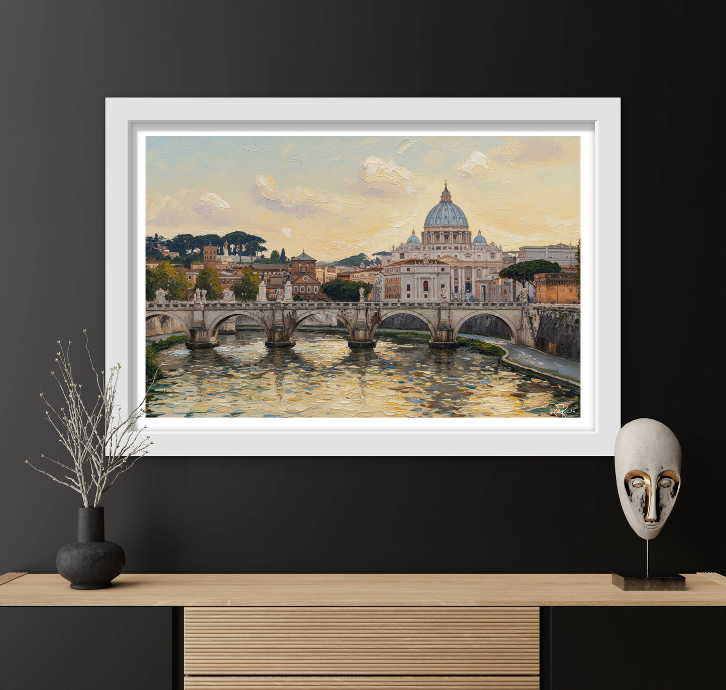 Framed artwork of a cityscape with a river and buildings, displayed on a dark wall with decorative items.
