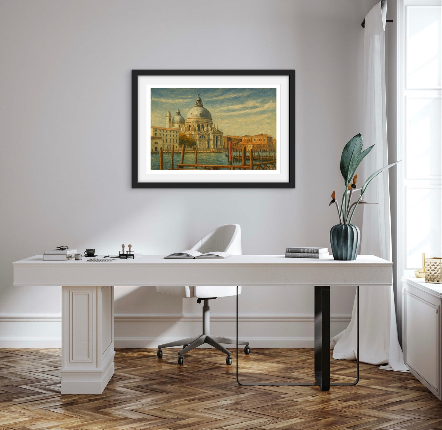 Modern office setup with a white desk, chair, and framed artwork on a wall.
